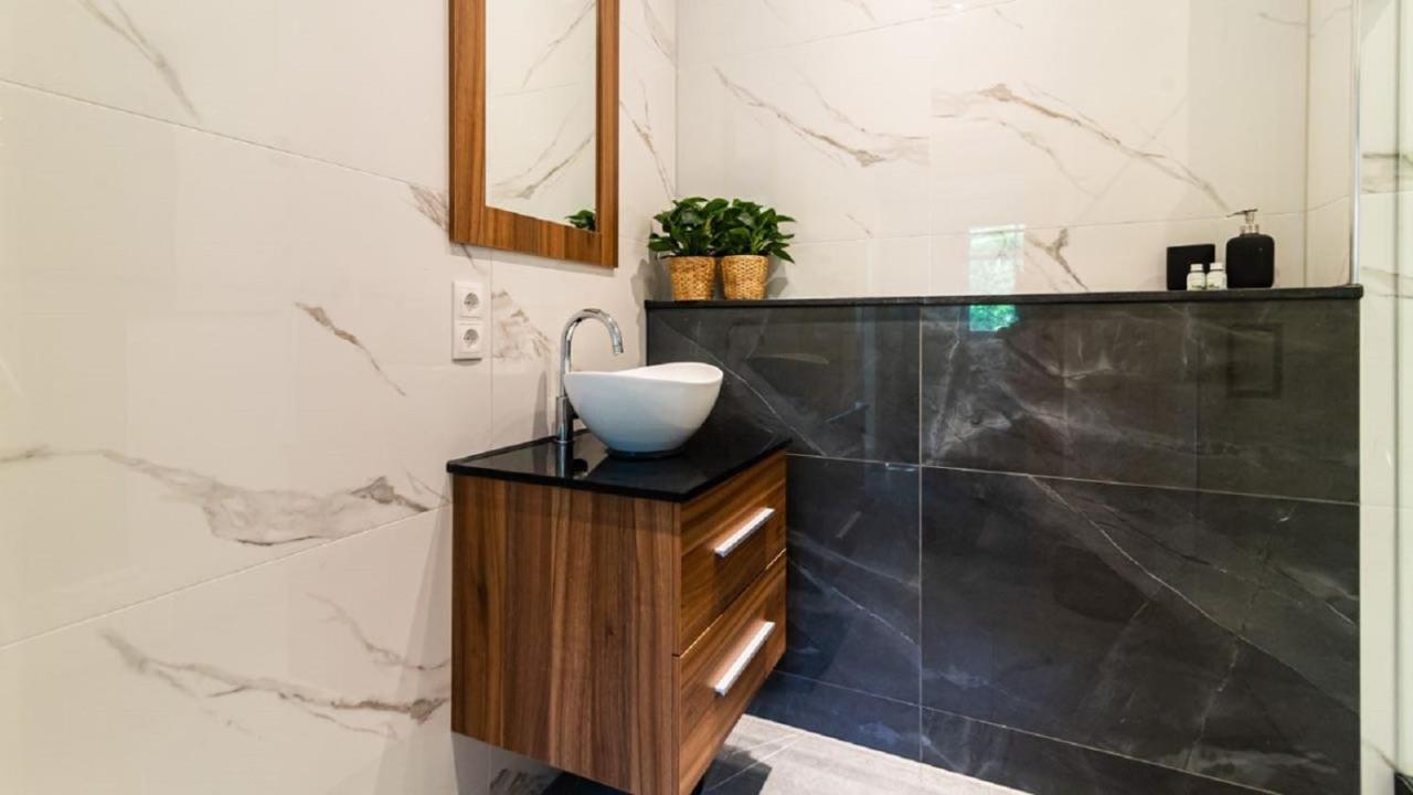 B&B Zilverstad Huisje De Veerpoort 斯洪霍芬 外观 照片